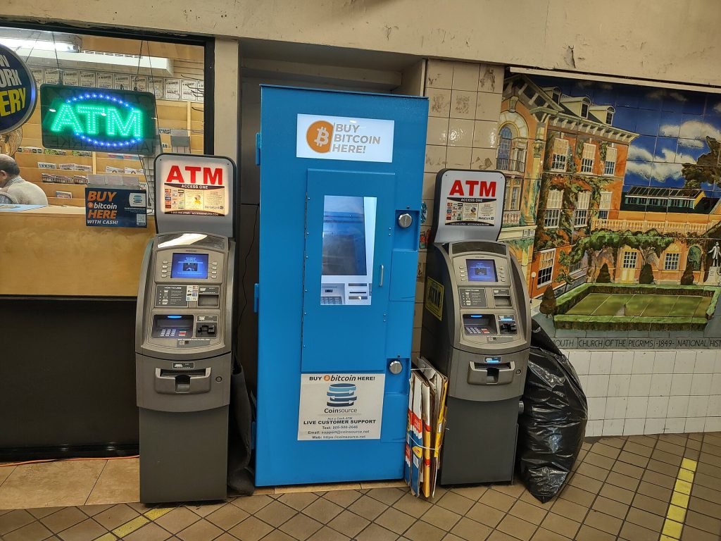 A bitcoin ATM at a city station